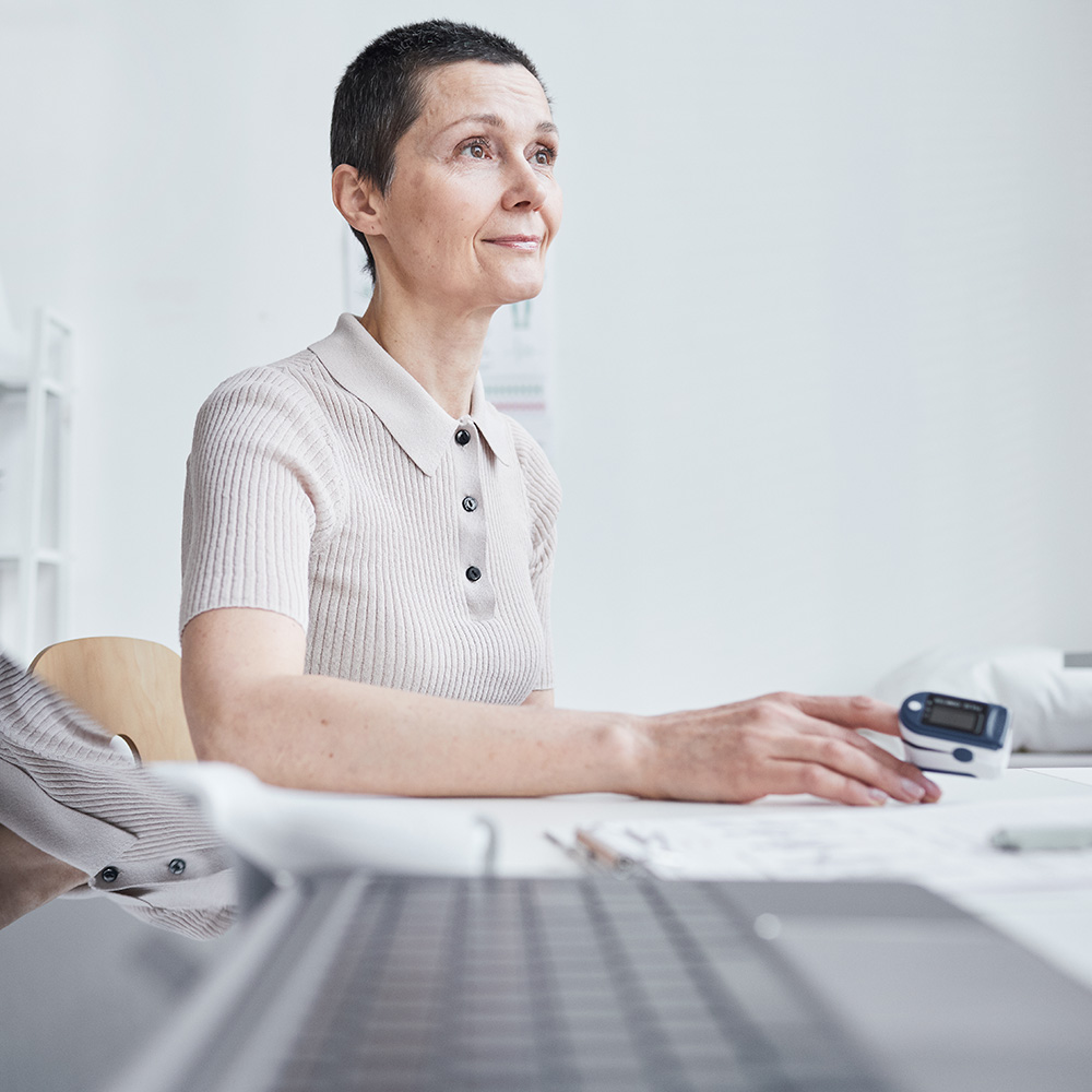 Woman sitting in a doctor's office